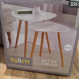 Set of 2 tables white with pine legs 
Brand new box has never been opened. 
Large 45 x 48 x 50cm
Small 40 x 40 x 40  cm