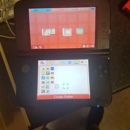 in good condition nintendo 3ds red with charger and 2 games Mario cart and sonic.selling due to buying nintendo switch.
