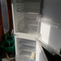 Fridge freezer to fit in a cabinet or free standing working perfect only two years old £20