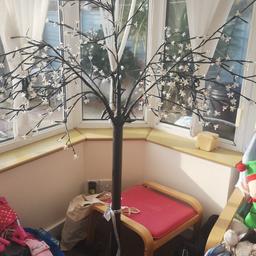 Around 6ft led tree for the garden or in the house never been outside very nice when lit up
