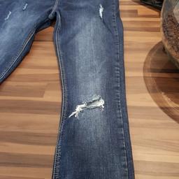 Size 12 distressed jeans never worn bought but too small on waist.literally like new no marks. From a no smoking home