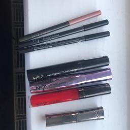 Selection of eye pencils, mascara, lashes conditioner, lips liner, lipsticks