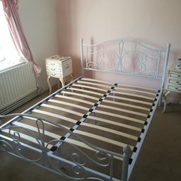 Double bed frame with one missing slat as shown.
No mattress.