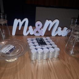 Mr and Mrs sign £3
Candles £2
Vases x4 £3
Cake stands x4 £3