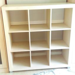 shelving unit in light Wood. very solid piece of furniture , measurements ,width 45 inches, height 47 inches,depth 15 inches,has a slight Mark on it ,hardly noticeable I've added to pics to show it