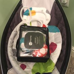4moms mamaroo baby rocker in used but good condition including baby insert which alone was £35
 Sadly the toy bar has had its day and hangs low (common fault).
 Has 5 different settings of motion and plays sounds like cars and crickets, mp3 plug in, multiple reclining positions etc. 
 Has served it’s purpose well..
