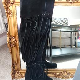 Over the knee, real suede uppers, black boots size 5. Completely brand new in original box.