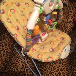 Vibrating chair with musical mobile in used condition. Baby loved it, the vibration helped him sleep