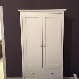 Beautiful M and S Double Wardrobe.
Panelled double doors with silver door pulls. Double hanging space with 2 small drawers and 1 large drawer underneath
Excellent condition only 4 months old