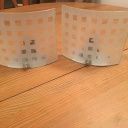 Pair of wall mounted tealight holders. Excellent condition. Barely used.