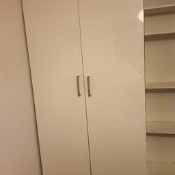 White and brown ikea wardrobe for sale. It’s in good condition but please bear in mind has been used in a child’s bedroom so some knocks and bumps.