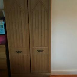 Wardrobe with double doors and lower drawer. Hanging rail and shelf inside.

Good condition. As shown.

Height: 187.5 cm
Width: 76.5 cm
Depth: 51.5 cm

Collection only.