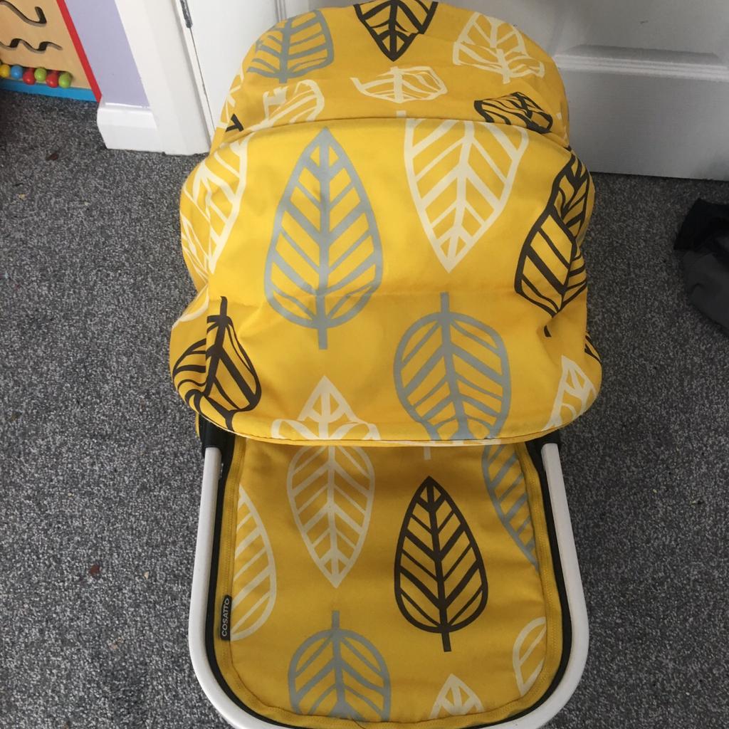 Cosatto yellow leaf store pram