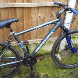 Good condition mens mountain bicycle. 21 speed shimano gears great tyres and mechanical disc brakes.  26 inch wheels and is fully ready to ride. A few paint chips but hardly noticable.