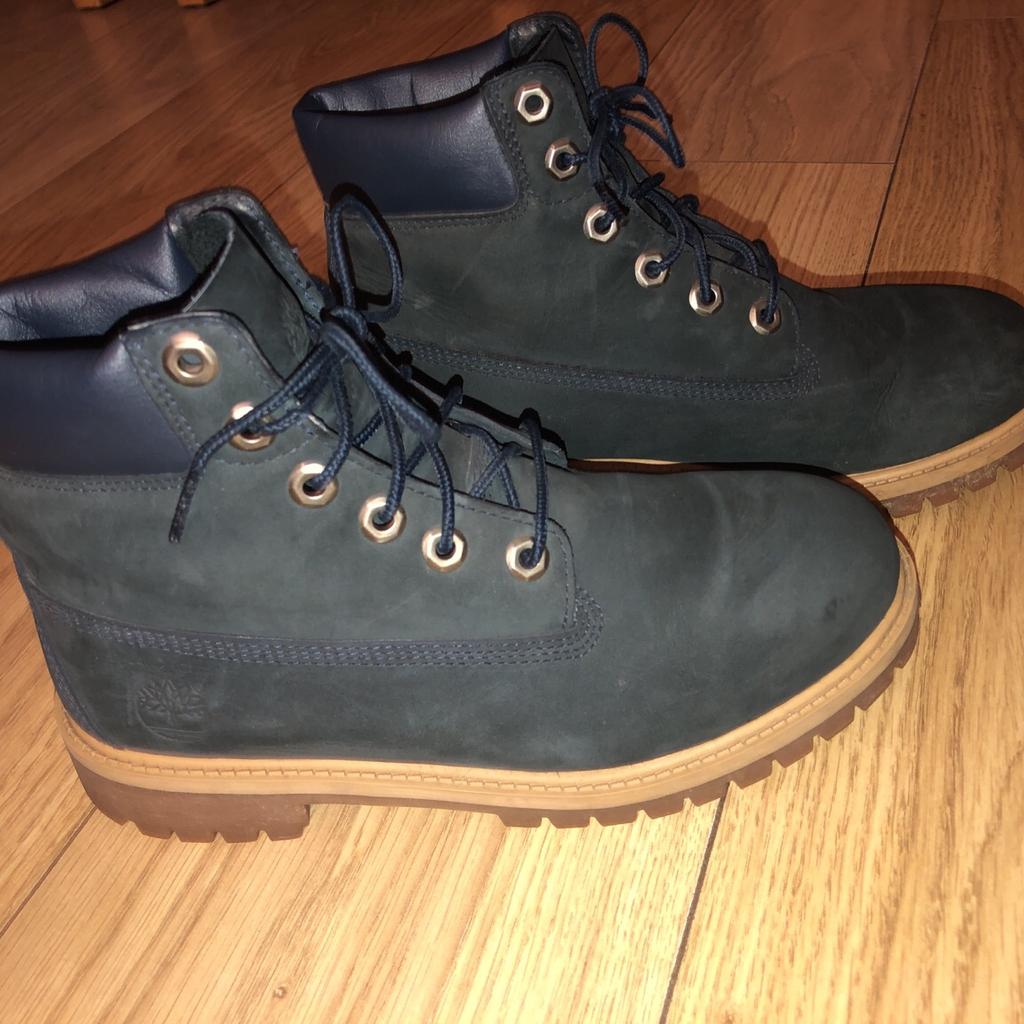Women Blue timberland boots in good condition.