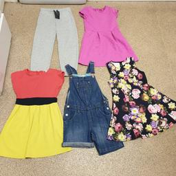 Nearly new and excellent condition Girls clothes bundle age 6-7 years. Consisting of:

1x gray with glitter and heart detail jogging bottoms
1x new without tags M&S denim dungarees
1x pink heart dress
1x pink, black and yellow dress
1 x flower detail dress

Collection from Wanstead, 2 mins from the central line, also happy to post for additional £2.95

Any questions pls ask ans also check out my other items xx