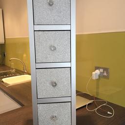 Next bathroom / Bedroom Accessory
Silver drawers with attractive silver sparkle detail drawer fronts with faux crystal drawer pulls. 
Very attractive item that is ideal for bathrooms or even to tidy small objects in a little girls bedroom. 
Versatile and attractive item.