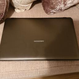 sturdy and fast laptop with a 15.6" touchscreen. Has 4gb of ram and 120gb solid state drive to keep it nice and quick. also comes with office installed. no charge and plastics for the DVD drive is missing but works absolutely perfect