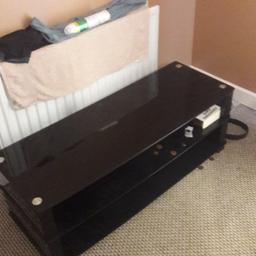 tv/ coffee table for sale no longer needed has minor surface scatches other than that is in good condition. pick up only
