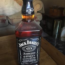 1litre bottle of jack daniels 
Bought for Christmas but not wanted.