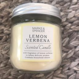 Brand new M&S lemon verbena scented candle with a silver screw jar top style lid. 25 hours burning time. A nice fresh lemon smell