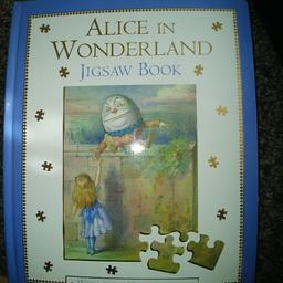 Alice in wonderland Jigsaw story book with 7 48-piece jigsaws 
All pieces are there.
Slight damage to corner of book as been in storage (please see picture). INSIDE IS FANTASTIC CONDITION