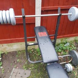 weights bench with weights dumbbells and curling bar plus punch ball on pole all for 50quid 