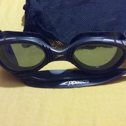 Speedo swimming goggles hardly used colour black comes with pouch as you can see in pic.