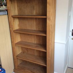 Solid and sturdy bookcase with four fixed shelves. Excellent condition. 36” wide x 71” high x 11” depth (approx.) NO OFFERS.