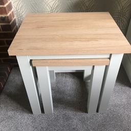 Light cream/grey colour with oak effect top. 
Matching sideboard for sale 
Buyer to collect from West Kingsdown 
Large table 40x50 cm
Small table 34 x 34 cm
