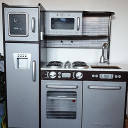 great condition. kids kitchen (uptown expresso) 

with toy food and pots etc.