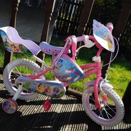 Girls Disney princess bike with stabilizers, age 3+ like new, with matching helmet, RRP bike £110 helmet £25 wanting £50 ono, collection halifax