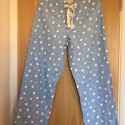 New with tags unused cotton pajamas.

100% cotton, baby blue with coffee mugs and types of coffee print by Love Gap.

Draw string for confront fit size Small US or 8- 10 Uk size