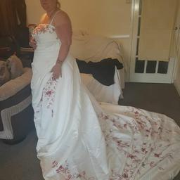 wedding dress size 24 lovely dress does need a dry clean has a mark on the front so don't know if that will come off so price is negotiable if want to talk about it 150 pick up only now 120 need gon e now 90