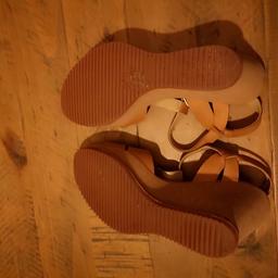 Tan leather straps , wedge sandals
Clarks comfort range
