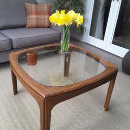 Lovely style and craftman made teak coffee table from the 70s has a couple of markes as per photo but am sure they can be easerly sorted. 760 mm wide x 465 mm high