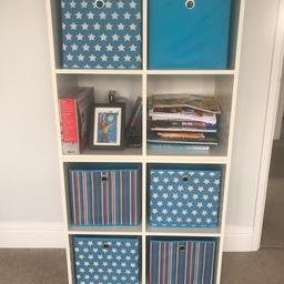 Two cube units - can be arranged vertically (as shown), horizontally or separated. Comes with 6 decorated storage boxes.