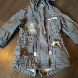 Grey girls coat with cute animal figures,
age 18-24 months 
good used condition 
from smoke free pet free home