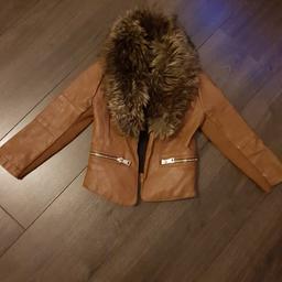 Age 3 with faux fur removable collar
good used condition 
very comfy light weight
from River Island 
from smoke free pet free home