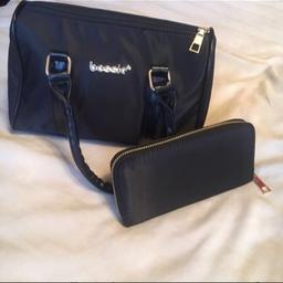 Ladies bag and purse
New without tag
Never used
2 pcs set
Colour black