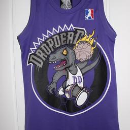 Basketball top
Brand - Drop Dead
Size - x-small/8

