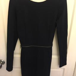 Zara. Size medium (roughly size 10). Navy. Zip detail around waist. Zip on back.

Only worn a couple of times.

Smoke and prt free house.

Collection only.