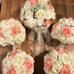Here is a hand made wedding flower bundle made from foam roses, New never been used, it consists of 
1x Brides bouquet
4x bridesmaid bouquet
2x flower girl bouquet
1x double flower button hole
6x Ivory Button holes
3x peach button holes 
(All with diamanté’s)