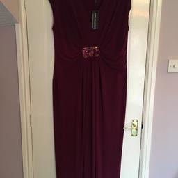 Brand new with tags size 24 Grecian style plum cap sleeve dress with gem detail at waist. Tag price £49. 54” long, postage to be added