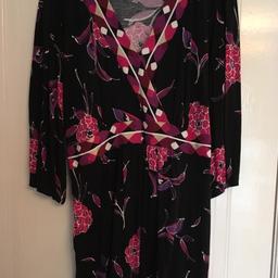 Evans size 22/24 black floral print with white flowers tunic top with crossover front detail and tie back at waist.
M & Co size 26/28 3/4 length sleeve crossover at front tunic top with tie back in red/black multi floral print.
Both jersey material, postage to be added