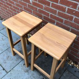 A pair of wooden bar stools. About 10 years old but in good condition.

Collection only.