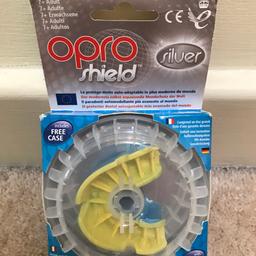 New and never opened. 
Opro self-fit mouthguard (gum shield) for age 7 + (and adults) 
Any questions please ask :-)