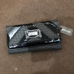 Wallet style genuine brand new Guess purse. Still has tags. Collection only.