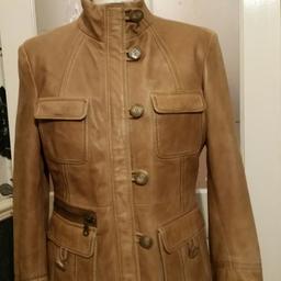 VGC FANTASTIC LOOKING SOFT LEATHER LADIES JACKET SIZE 12  COLOUR IS LIGHT TANNED BROWN
CAN BE PICKED UP 
OR BUYER PAYS  THE POSTAGE