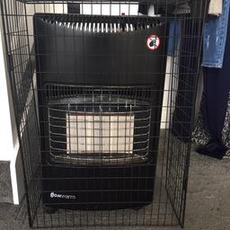 Portable gas Heater comes complete with bottle connector and safety guard. 
The heater has 3 heat settings and works very efficiently and is cost effective. The addition of the free standing safety guard is important where there are children or pets.